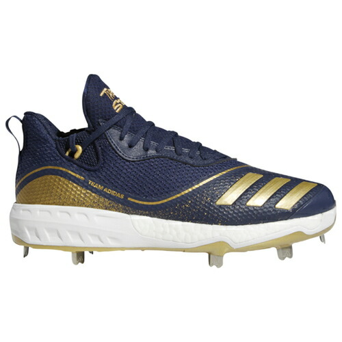 gold and black adidas cleats