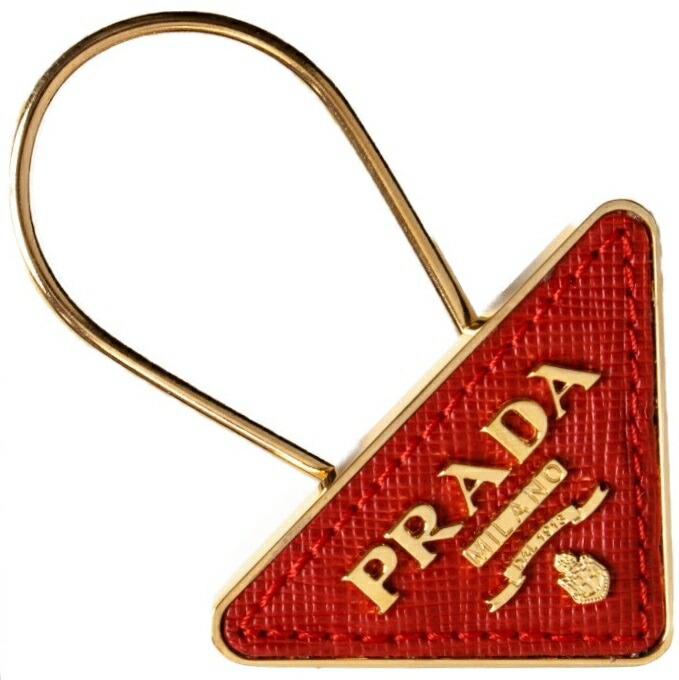 PRADA 1PP301-053-F068Zプラダ キーホルダートライアングルプレート 足懸かり引っ掛かり(取りはらい能力のある)サフィアーノ（型押子ウシ）×金属元素 フォーコレッド×ゴールド※取寄品