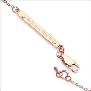 michael kors rose gold crystal logo disc pendant