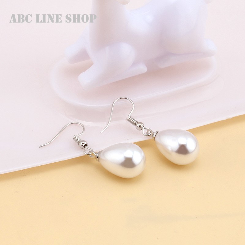 楽天市場】ニッケルフリー ピースマーク スワロフスキー イヤリング