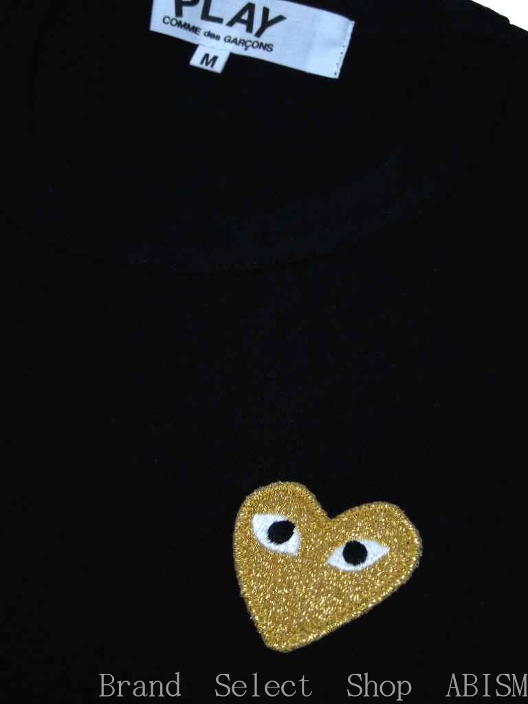 black and gold comme des garcons