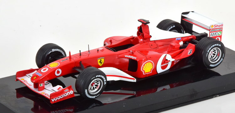 Premium Collectibles 1/24 フェラーリ F2002 ワールドチャンピオン 2002 Schumacher in blister Premium Collectibles 1:24 Ferrari F2002 World Champion 2002 Schumacher in blister