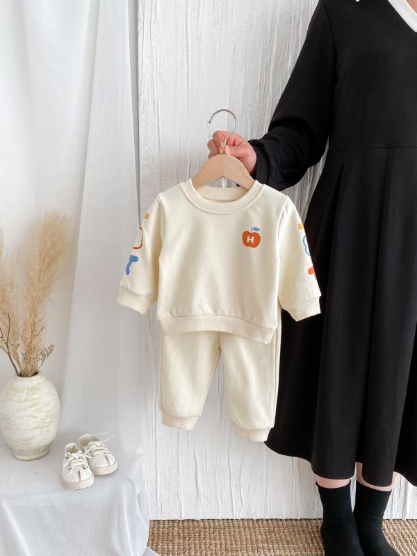 セットアップ 女の子 ベビー 幼児 1歳 2歳 3歳 長袖 薄手 スウェット トレーナー パンツ 春秋 韓国風 おしゃれ カジュアル スポーツウェア 普段着 部屋着 2点セット 綿 コットン やわらか素材 キャラクタープリント 杏色 アプリコット