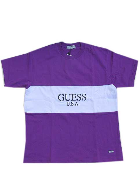 green and purple guess shirt