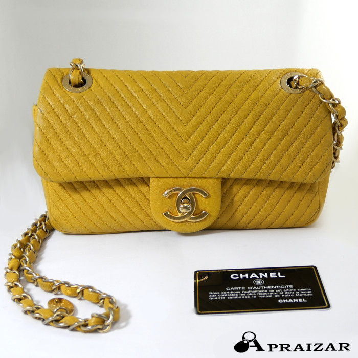 CHANEL シャネル レザー シェブロン ココマーク チェーン ショルダーバッグ イエロー Vステッチ カード付   [中古]