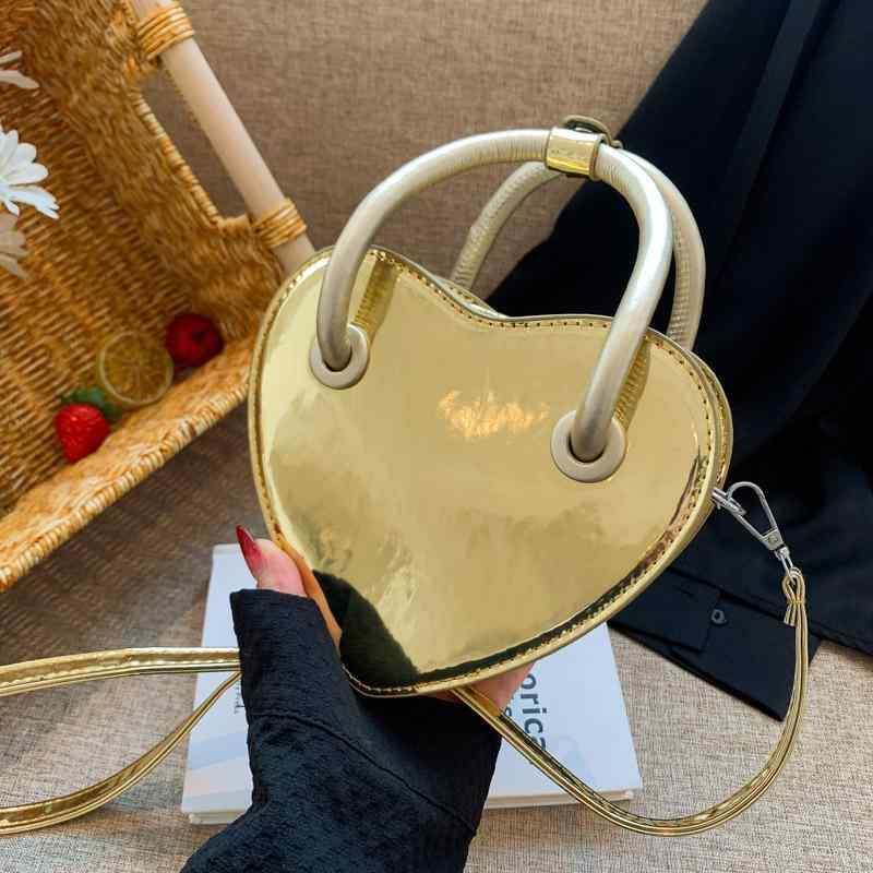 レディース ハンドバッグ ミニ ショルダーバッグ ハート型 チェーン バッグ 光沢 革 斜め掛け 黒 金 銀 ピンク 街頭 ファッション トレンド PU素材 硬め ジップ開閉 車縫い 切り替え 日常 コーディネート 肩紐3本(x500)｜アスターショップ