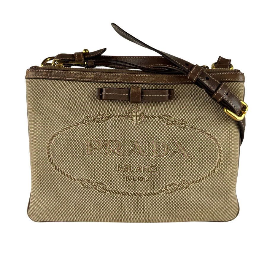 プラダ PRADA ショルダーバッグ ロゴタイプ ジャかばい立て 帆布/なめし革 赤銅色 レディース 貨物輸送無料【中古】 z9947
