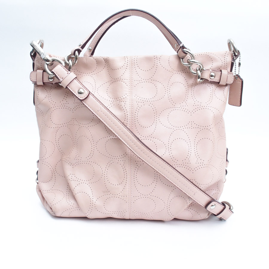 pink and white coach bag