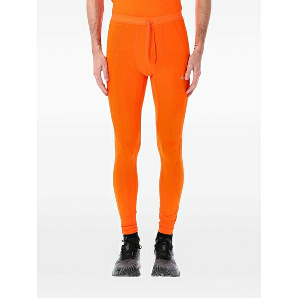 ナイキ メンズ 心地よいズボン下 ボトムス Wildsee drawstring leggings Orange