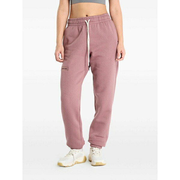 アンダーアーマー レディース カジュアルパンツ ボトムス Project rock icon track pants Purple｜asty