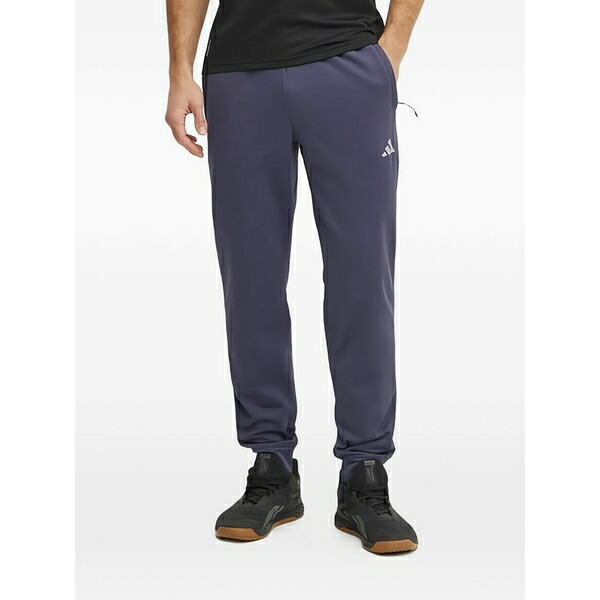 アディダス メンズ カジュアルパンツ ボトムス Logo-pattern track pants Blue｜asty