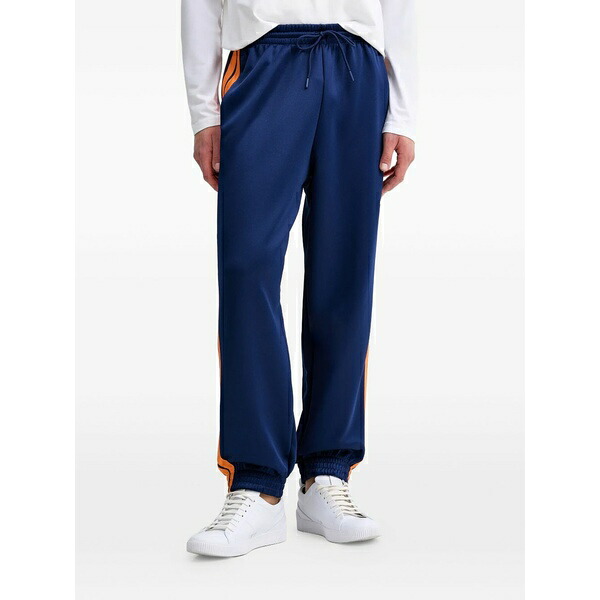 アディダス メンズ カジュアルパンツ ボトムス Stadium logo-print side-stripe track pants Blue｜asty