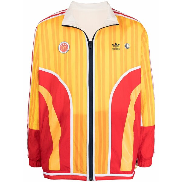 アディダス メンズ 上衣＆上衣 アウター Reversible track jacket Yellow