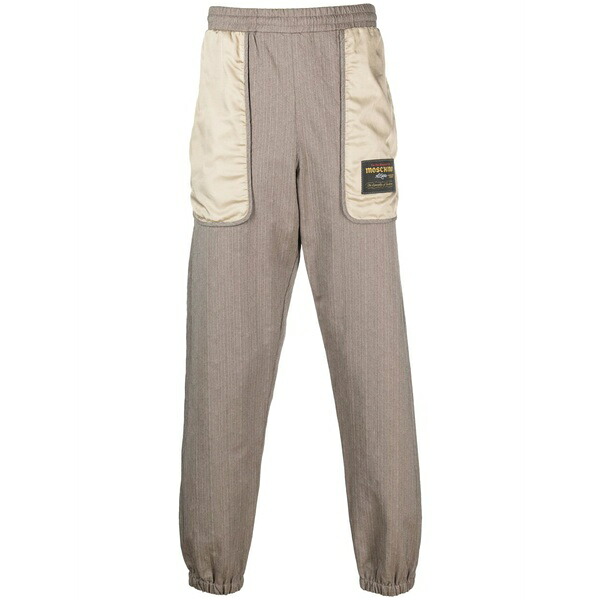 モスキーノ メンズ カジュアルパンツ ボトムス Logo-patch panelled track pants Brown｜asty