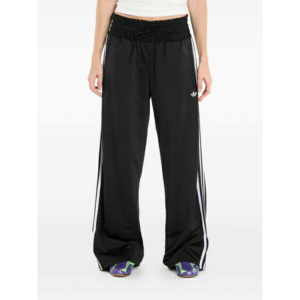 アディダス レディース カジュアルパンツ ボトムス Smocked firebird track pants Black｜asty