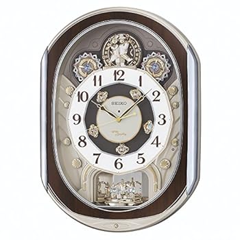 【中古】セイコークロック 掛け時計 からくり時計 電波時計 アナログ からくり 40曲 メロディ 回転飾り 薄金色 パール RE578B