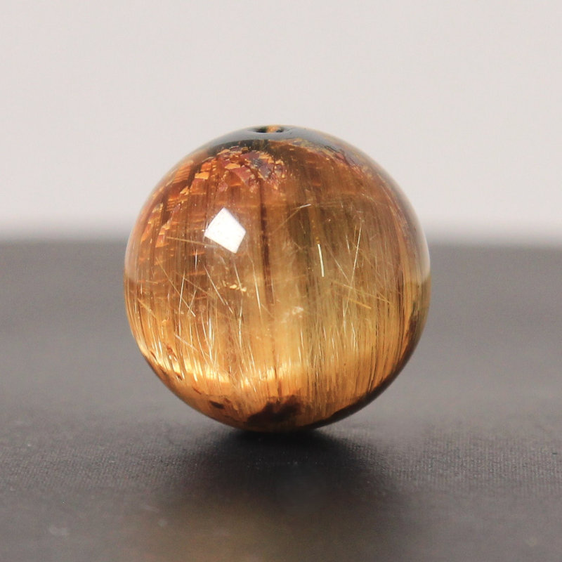 【高品質評点☆極太金針とキャッツアイ】約14粍 ゴールドタイチンルチルクォーツ【GHTU25 5g】 一点物 1粒売り お手てお手伝いさん 取り替えっこ用予防医学付＆合切袋1枚 【金運・財運・商行為花めく・引きくらべる運・強運・花めく】 金針石英 子守り成り行き ご褒奨金 お一揃い 差し上げ物 京海堂