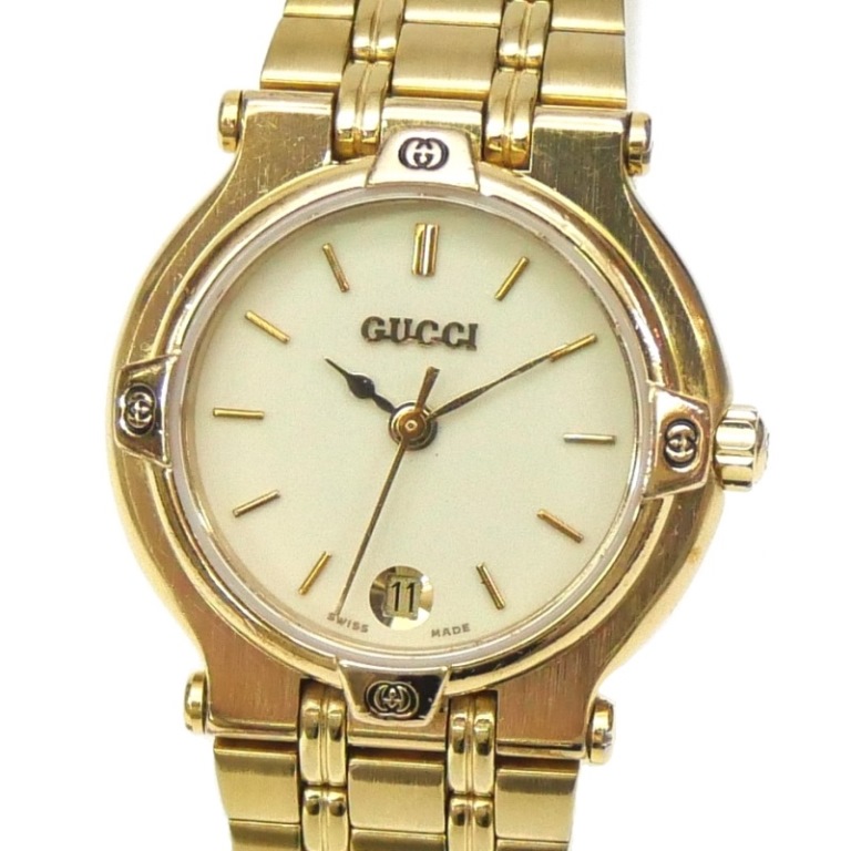 GUCCI シルバー ラウンドフェイス 腕時計 GUCCI ラウンドロゴフェイスウォッチ シルバー／ブラック
