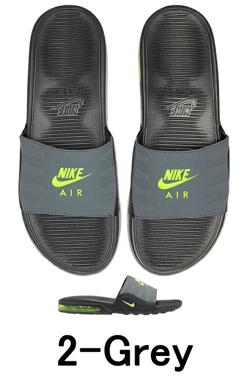 black and gold nike flip flops
