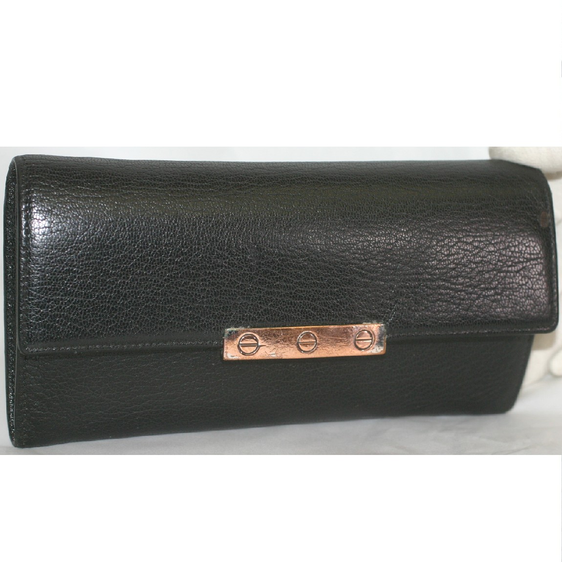 【中古】本物カルティエのジッパー御釣り入れ付長紙入れの目じるしロゴバーホックの真っ黒いパステル色の革原材料 大きさW19H10D2,5糎 ○C14-255