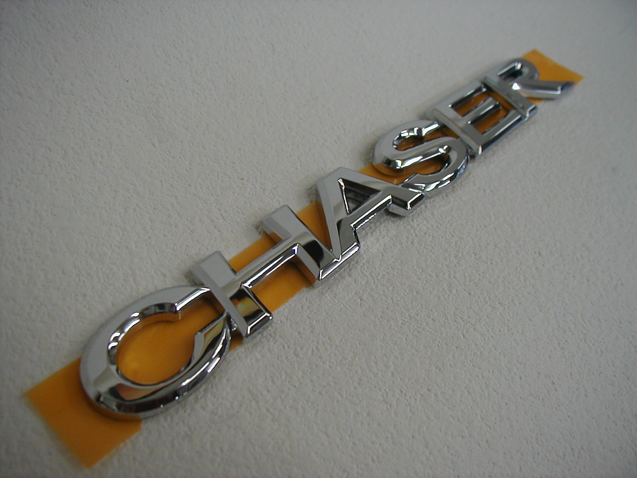 楽天市場 トヨタ純正 シルバーエンブレム リヤ 車名ロゴ チェイサー 100系 カズ オートセールス楽天市場店