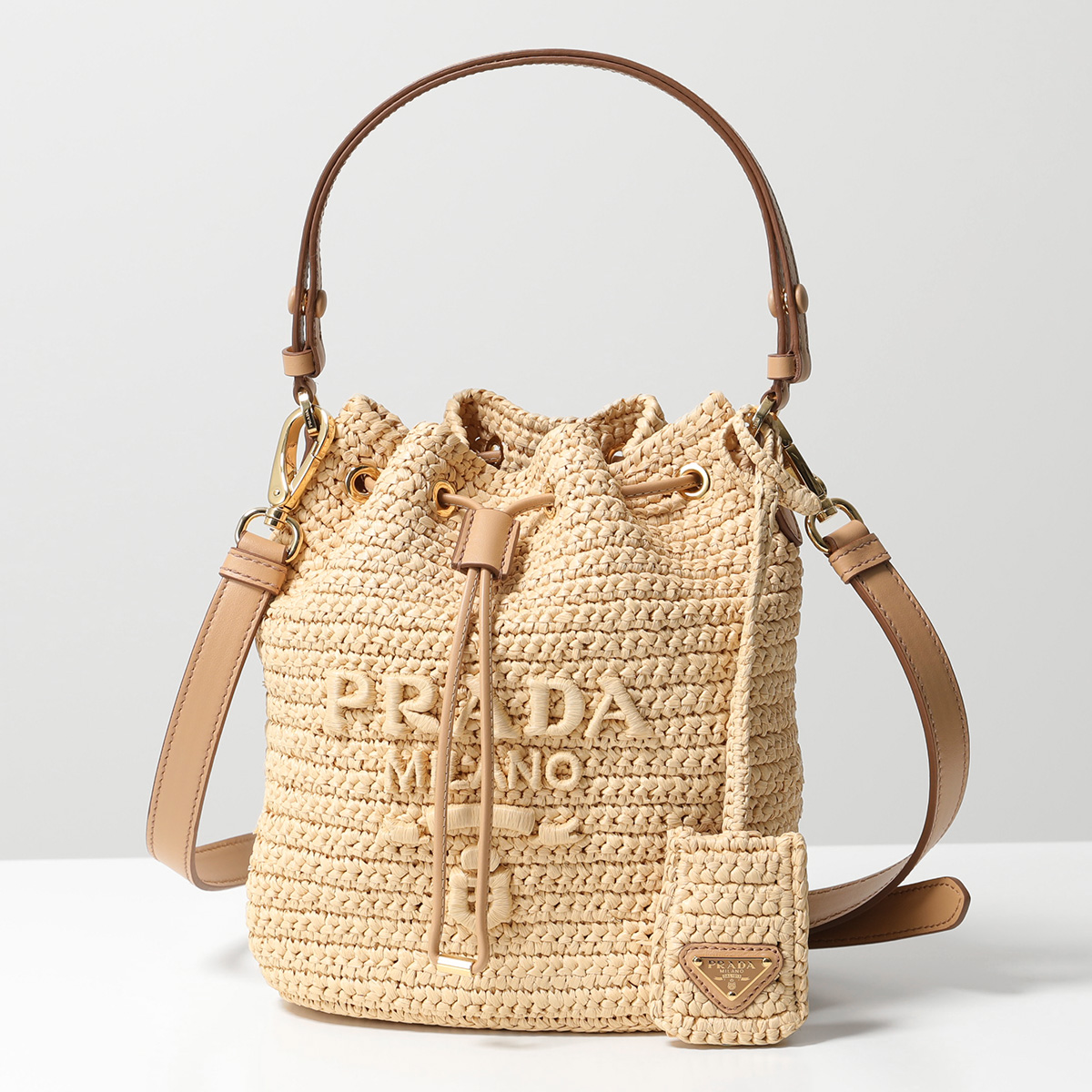 楽天市場】PRADA プラダ バケットバッグ 1BE068 2A2T OUO レディース