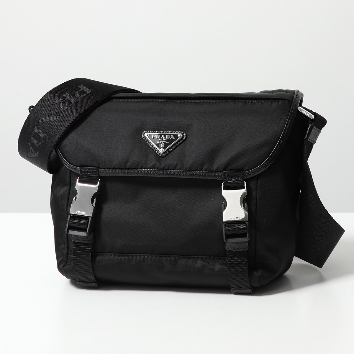 バッグ・カバンその他 PRADA 1BB137 V OOO 2CYR ブラック プラダ ダングル レザー トップハンドル ミニバッグ