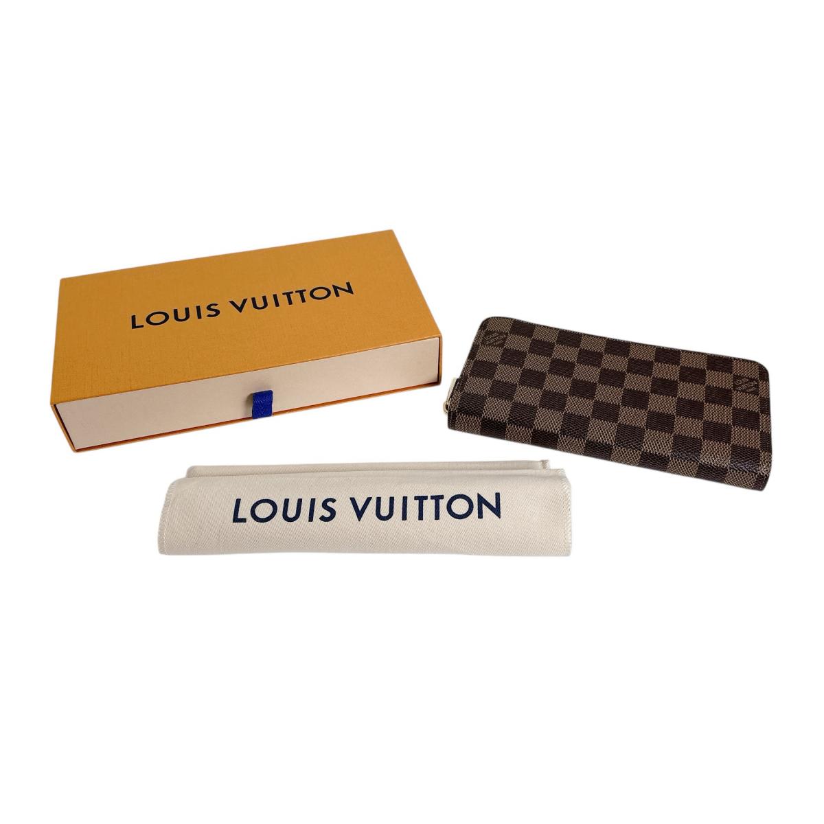 ルイヴィトン LOUIS VUITTON 長銭入れ 長銭入れ  ダミエ ジッピーウォレット 帆布 N41661 エベヌ LV 【SS】 【中古】