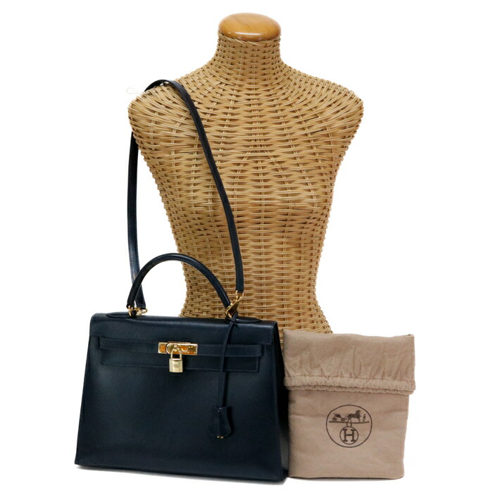 【ABランク】 エルメス HERMES ケリー 32 外縫い ボックスカーフ (レザー) GD金具 〇W刻印 (1993年) ハンドバッグ 手提げかばん トップハンドルバッグ 2WAYバッグ レディース メンズ ブルーインディゴ (ネイビー) 正規品 中古 mbx15005｜p.o.s.h. Online Store 店