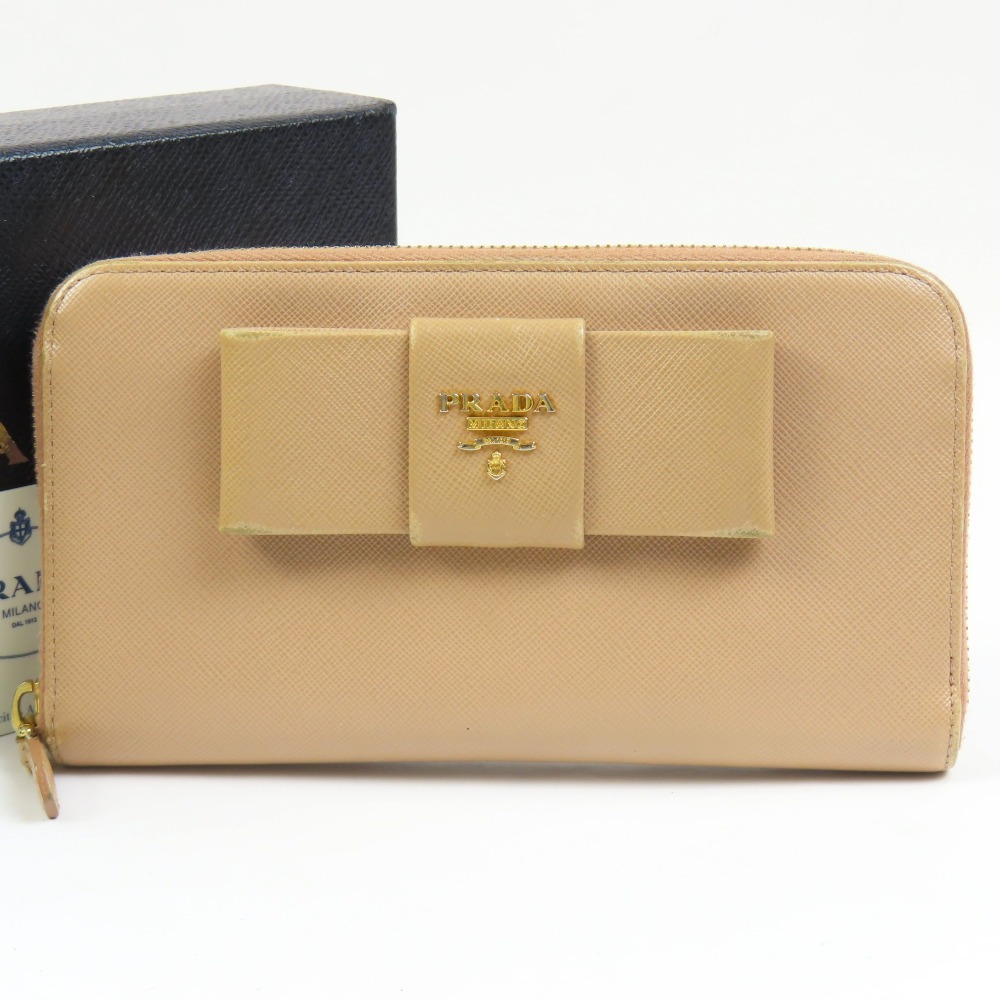 プラダ リボン ロングウォレット ラウンドファスナー長財布 サフィアーノレザー ベージュ レディース【中古】 本物 PRADA