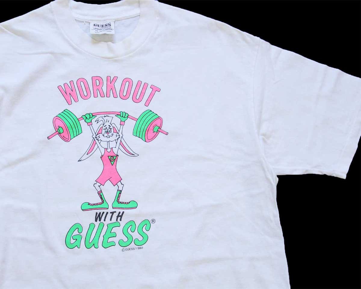 \u003cBR\u003e80s USA製 GUESS by GEORGES MARCIANO ゲス WORKOUT WITH GUESS 家兎 さし絵 螢光刷り上げる 綿織物ティーシャツ 象牙色 【中古】