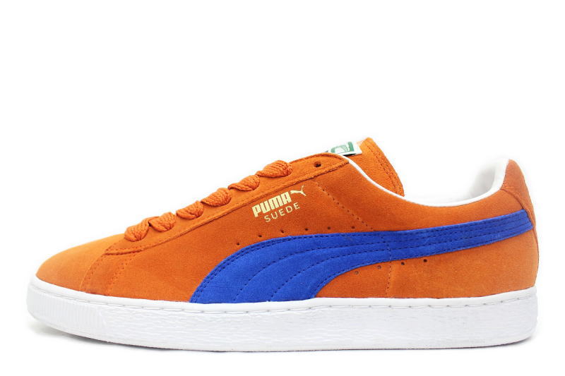 blue and yellow puma suede