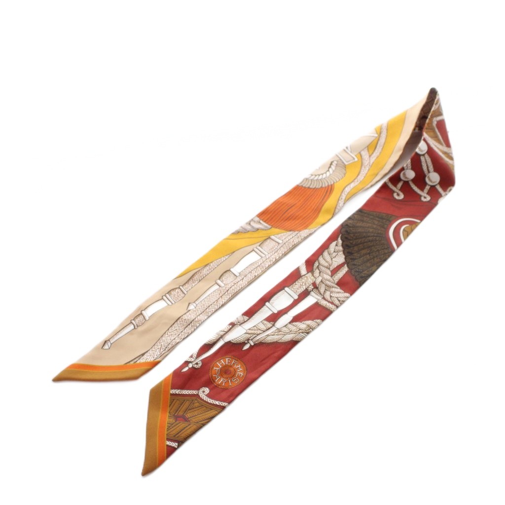 【中古】エルメス HERMES Zouaves et Dragons ズアヴと火竜 ツイロバート・エドワード・リー 地絹 えり巻き オレンジ色 黄味がかった 白 白いこと 総柄 /RI ■os ■OH レディース 【ベクター 古着】 260514