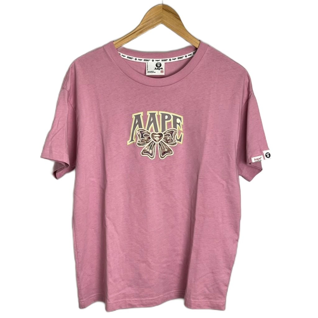 【中古】アベイシングエイプ A BATHING APE AAPE リボンモチーフ ワッペン Tシャツ 半袖 カットソー クルーネック XS ピンク AAPTEW1581XXN レディース 【ベクトル 古着】 251104｜ブランド古着の買取販売ベクトル