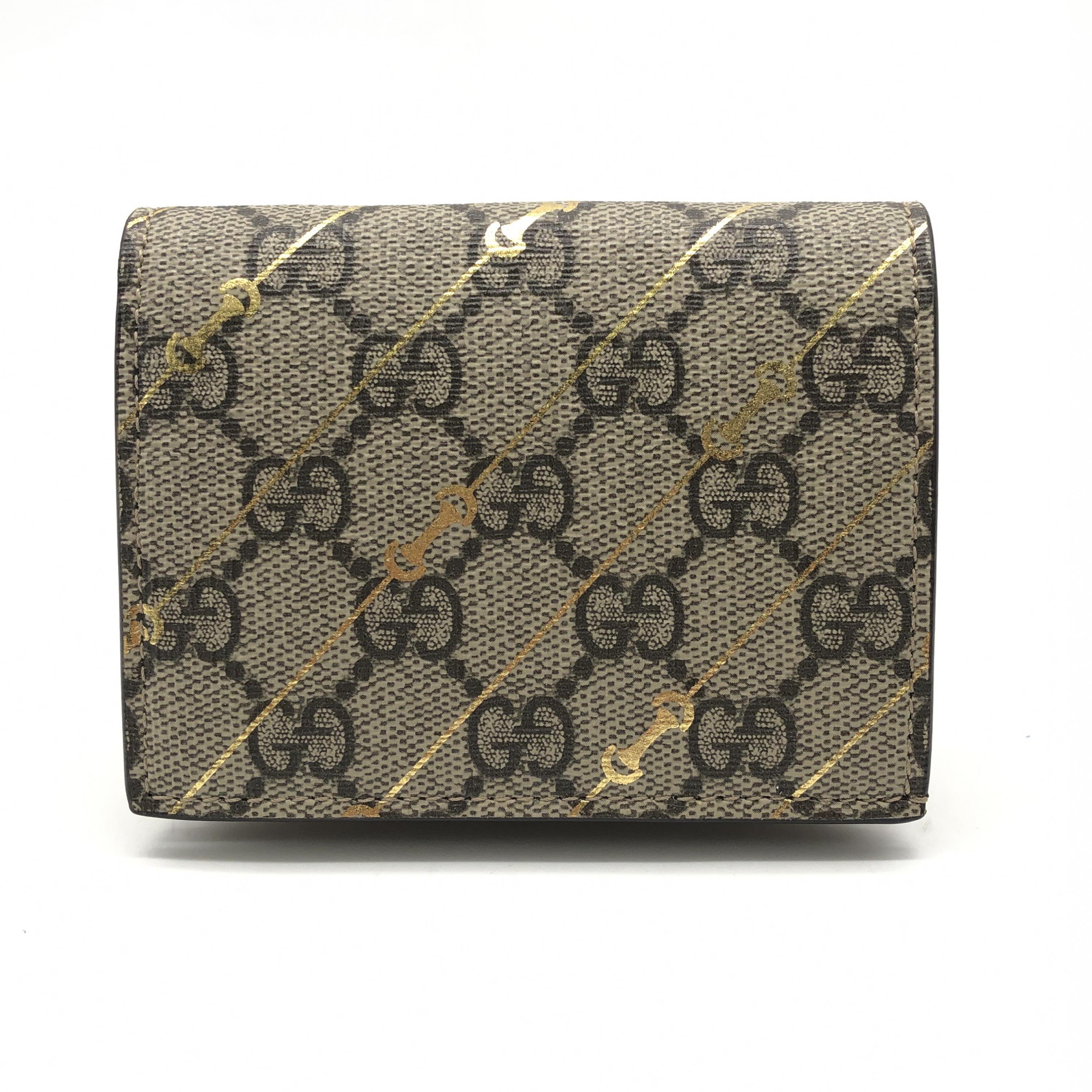 GUCCI 二つ折り財布 GG スプリーム タイガー ベージュ GUCCI GGスプリーム 二つ折り財布 タイガープリントの買取実績