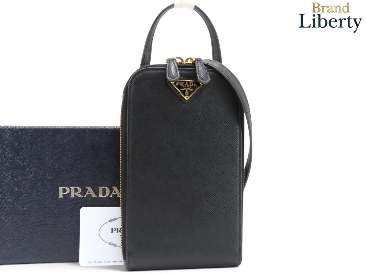 【ほぼ新品】プラダ PRADA サフィアーノ スマートフォンケース 電話機車寄せ ポシェット 曲がった掛けショルダーバッグ NERO 黒いこと なめし革 1BP027 【中古】