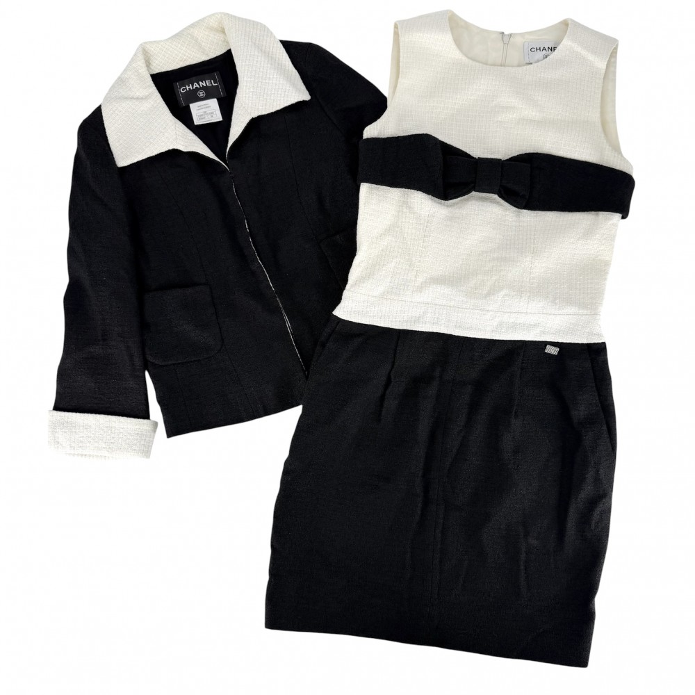 シャネル セットアップ レディース ツィード バイ色合い 上衣 ノースリーブ衣装 お召しもの 服 CHANEL 38 黒いこと 黒 白いこと 白 しろがね色金具 リネン  綿織物  羊毛  ナイロン 春 秋【中古品】