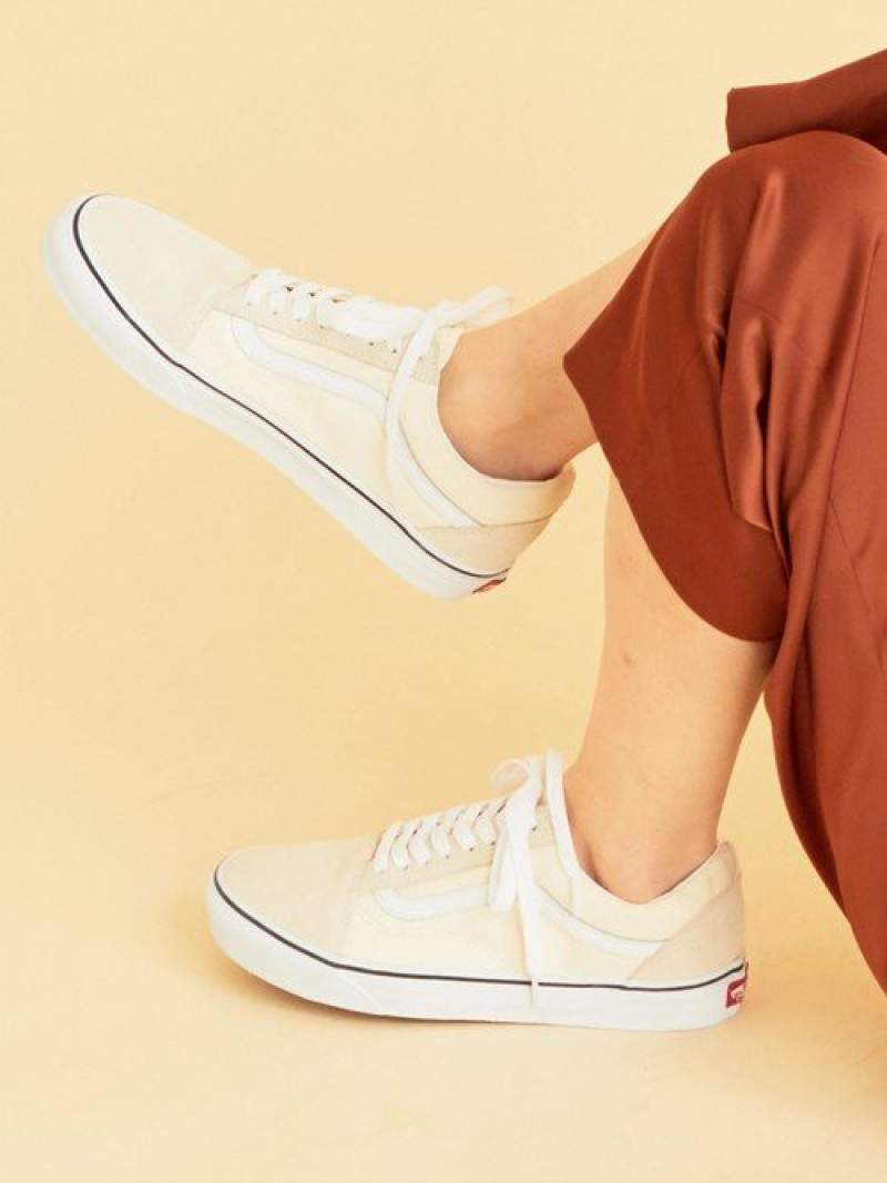 white vans slip ons youth