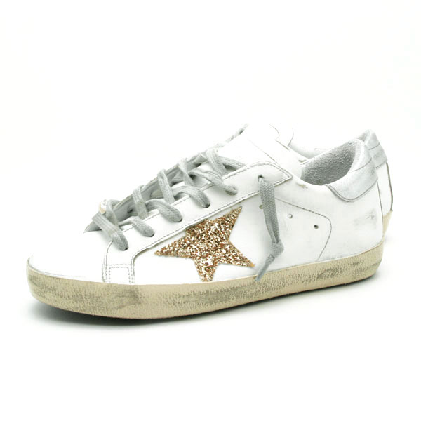 gold and silver golden goose sneakers