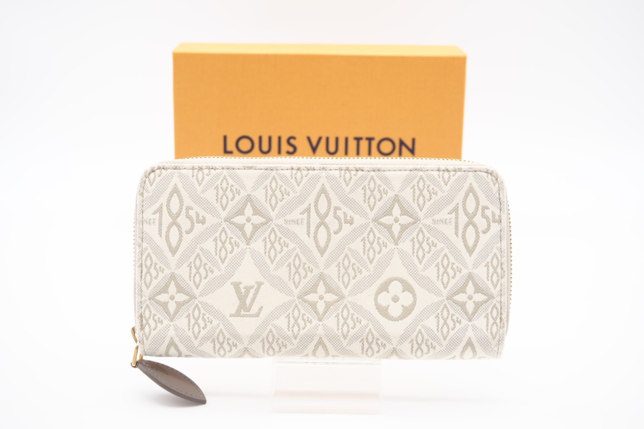 ★3日以内返品可★ 美品 LOUIS VUITTON ルイ・ヴィトン ジャガード Since1854 ジッピーウォレット M81172 長財布 アイボリー キャンバス レディース【中古】 45,264円
