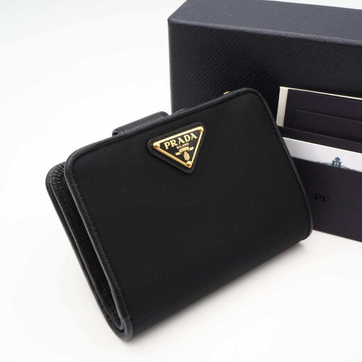 ★3日以内返品可★ 未使用 PRADA プラダ テスート レザー コンパクトウォレット 1ML018 二つ折り財布 ブラック ナイロン サフィアーノ レディース【中古】｜リユースショップ BICLOCK 48,798円