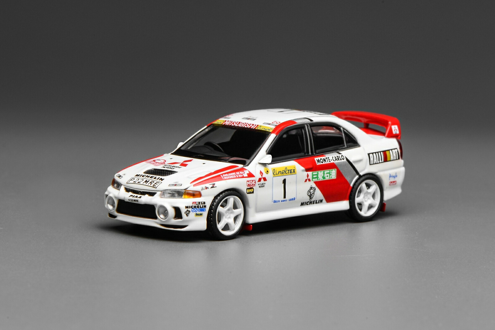 MOTORHELIX 1/64 MITSUBISHI LANCER EVOLUTION IV GSR MONTE CARLO LIVERY 【M64010】 (ミニカー)画像