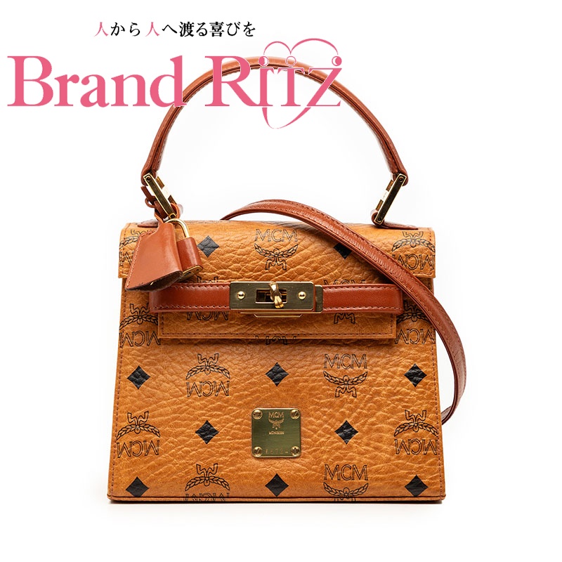 【この上なくお得!!引き換え証あり＆10％OFF】中古 エムシーエム ヴィセトス とっ始め手持ち部分 ハンドバック ショルダーバッグ 2WAY 台形御徒面子 折りかえし鍵を掛ける 赤銅色 なめし革 レディース MCM 【貨物輸送無料】【西神店】