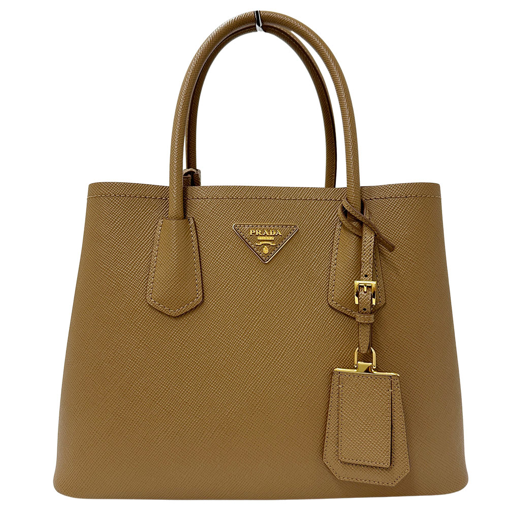 【全品5％OFFクーポン券別れ別れ中!】プラダ PRADA 御徒面子 レディース ブランド名 トートバッグ  なめし革 赤銅色 1BG887 駱駝 大き目 美品 【中古】
