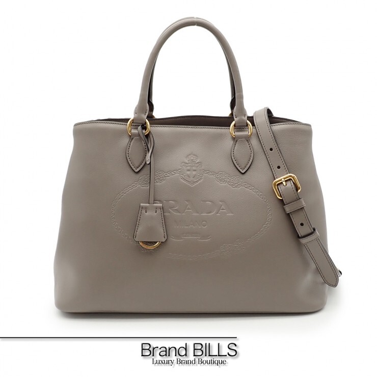 未当て嵌める品 PRADA プラダ エンボスロゴ ハンドバック 2way御徒面子 1BA579 グレースカーフレザー グレージュ レディース 【中古】