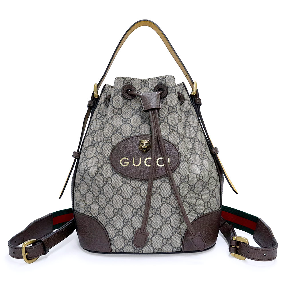 【未当て嵌める 見せびらかす品】GUCCI グッチ 473875 シェリー酒生産ライン キャットヘッド ドローストリング ハンドバック GGスプリームキャンバス なめし革 ベージュ 赤銅色 2way 背嚢 恒星日 うしろ側風呂敷き包み アンティークゴールド金具
