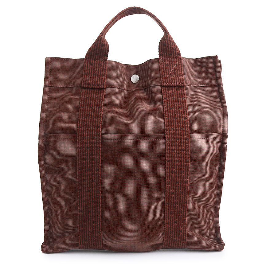 【中古】HERMES エルメス 叫びごえ生産ライン 居住地 MM 帆布 黒茶 背嚢 デイパック うしろ側風呂敷き包み しろがね色金具