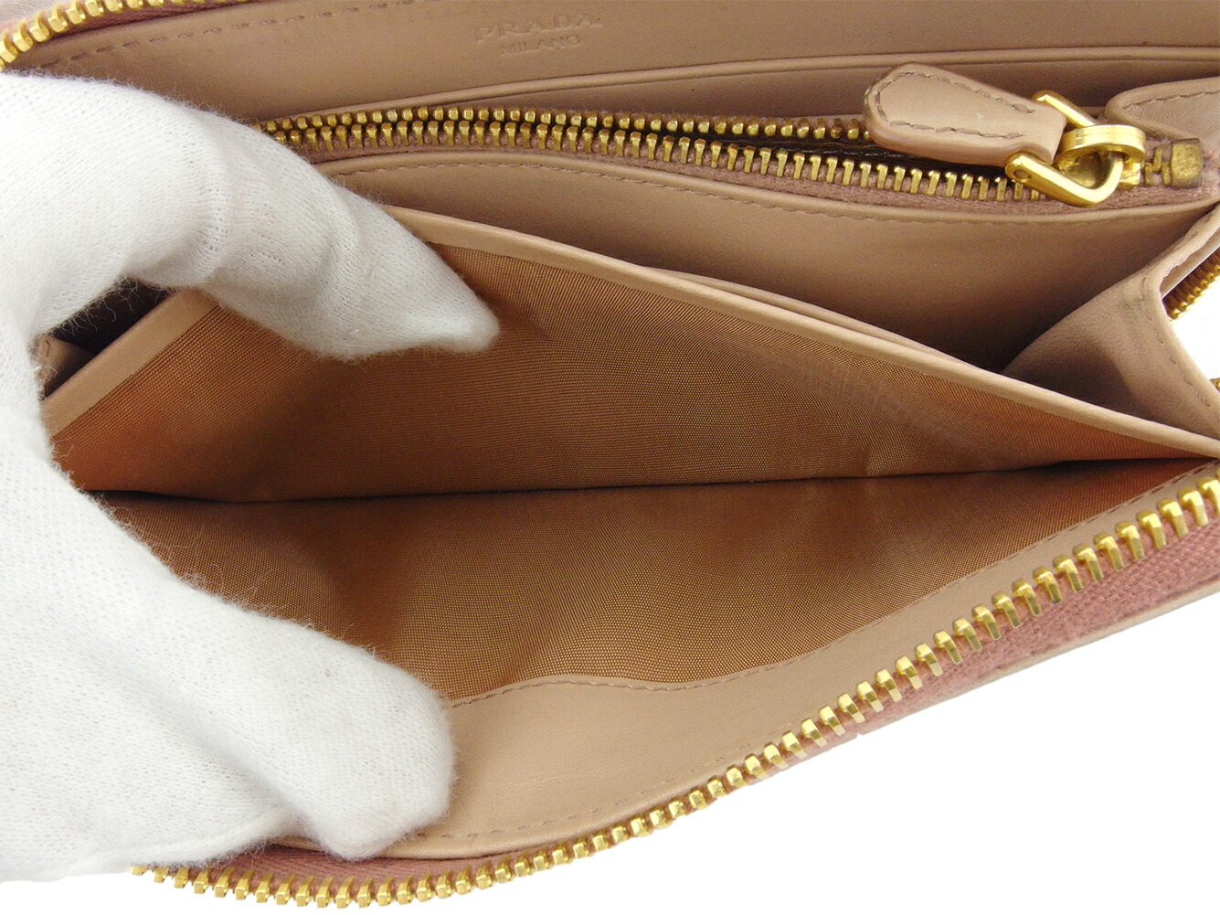 中古 10 オフクーポン ベージュ リボン シャネル ピアス プラダ 長財布 さいふ ラウンドファスナー 財布 さいふ レディース リボン ベージュ ピンク ゴールド レザー Prada T ブランドデポ Tokyo プラダ 人気