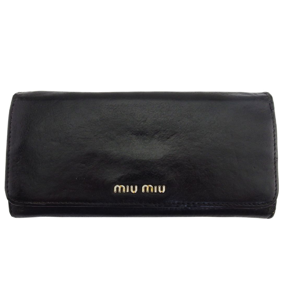 【雨季得SALE★21％OFFクーポン券】ミュウミュウ 長紙入れ ロゴタイプ 黒いこと 赤銅色 ユニ一発やる 中古 MIUMIU