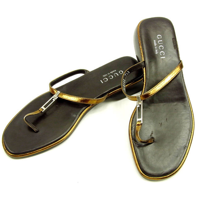 gold gucci flip flops